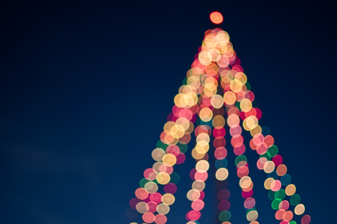 Out of focus image of lit Christmas tree